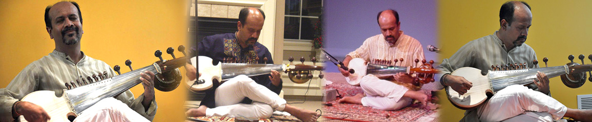 A man sitting on the floor playing an instrument