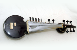 A black and silver instrument sitting on top of a table.